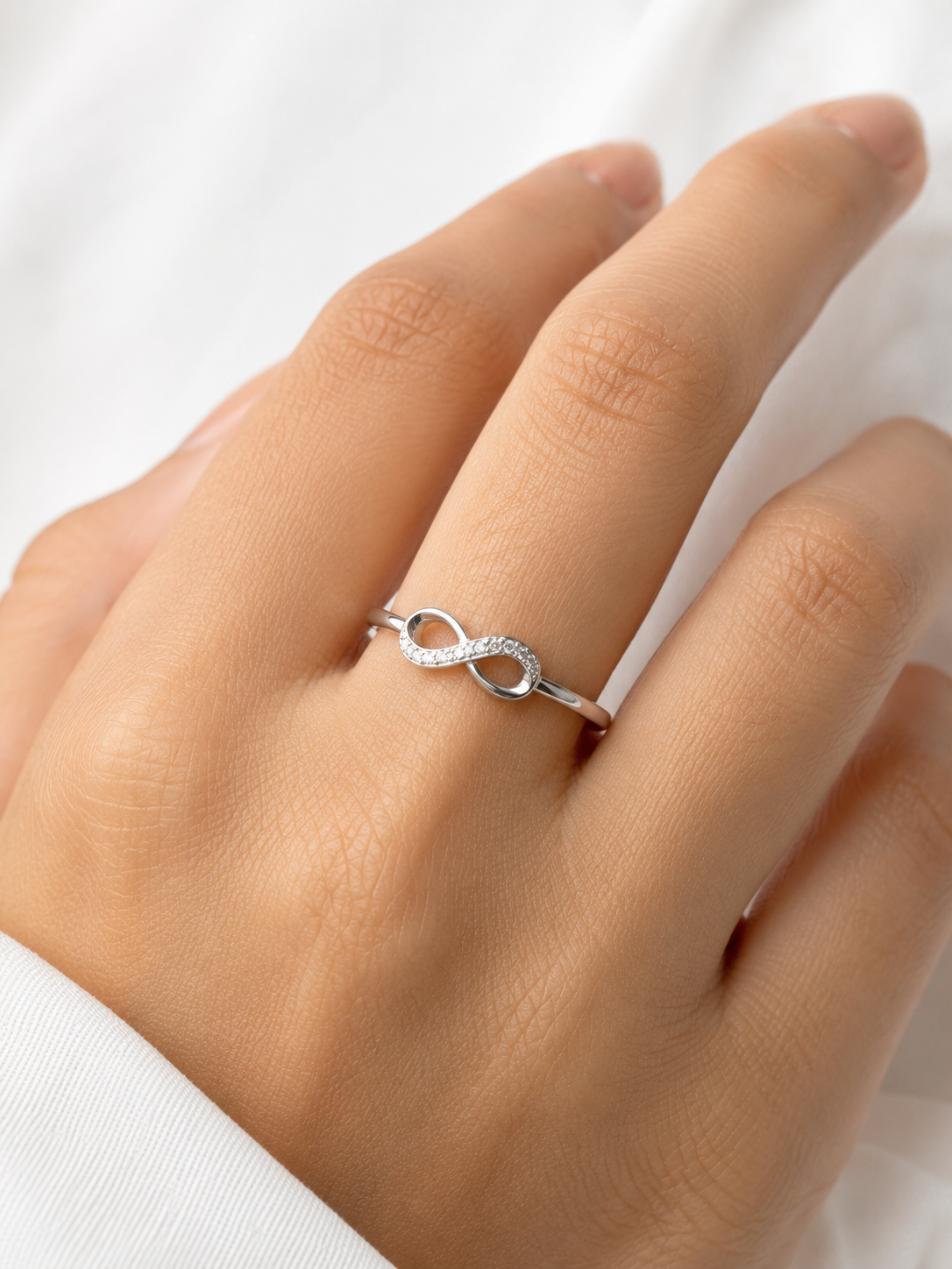 Zircon infinity ring