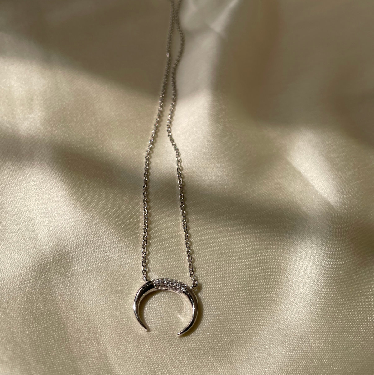 Horn crescent necklace