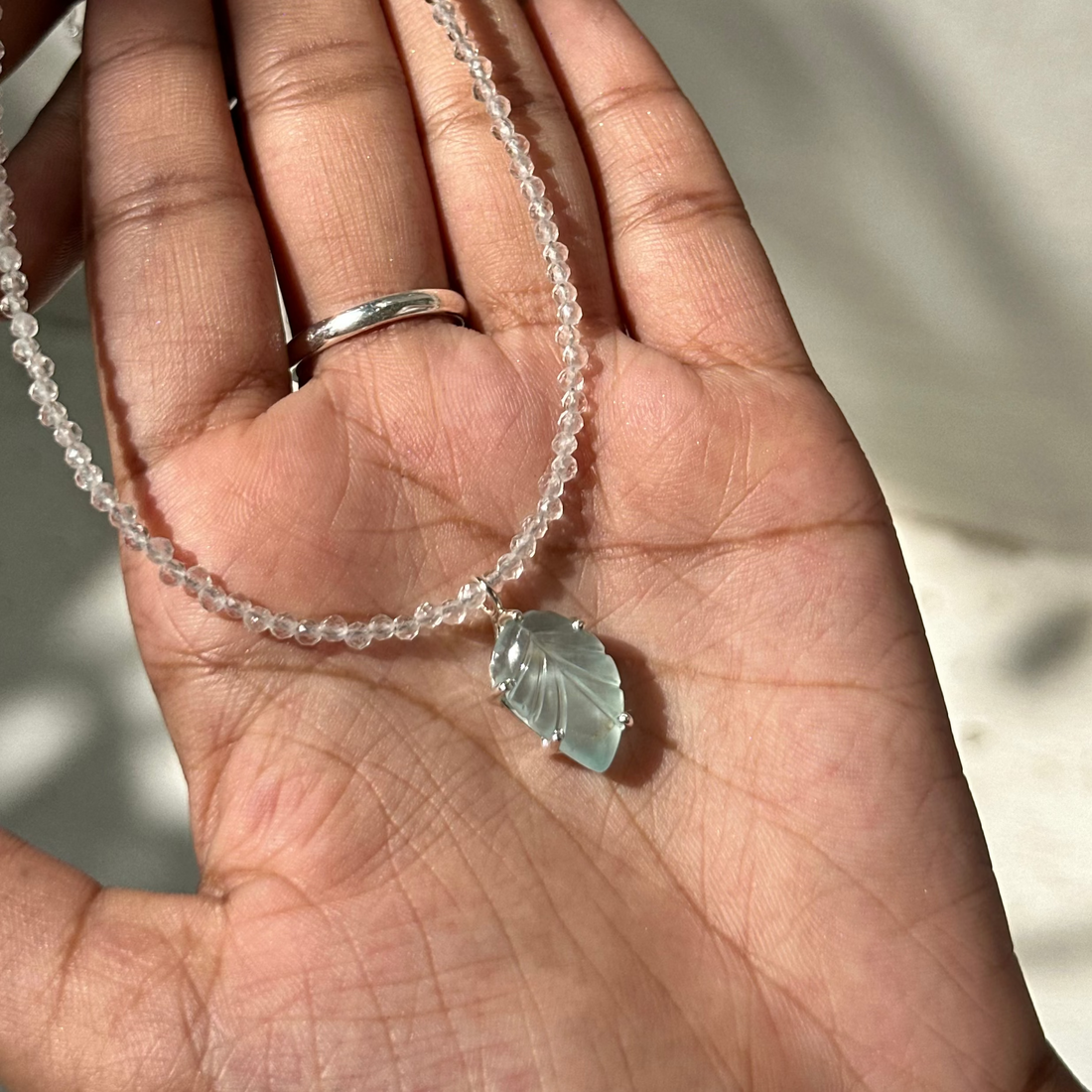 Aquamarine leaf locket