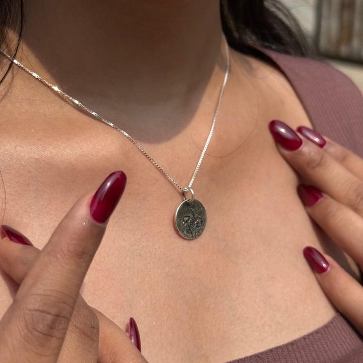 Flower charm locket