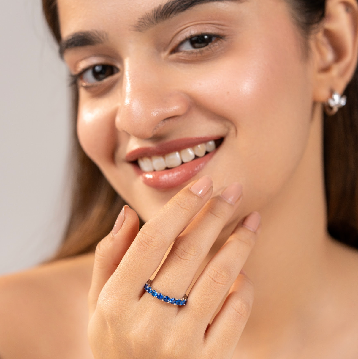 Blue zircon eternity band