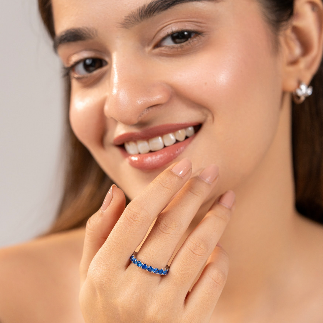 Blue zircon eternity band