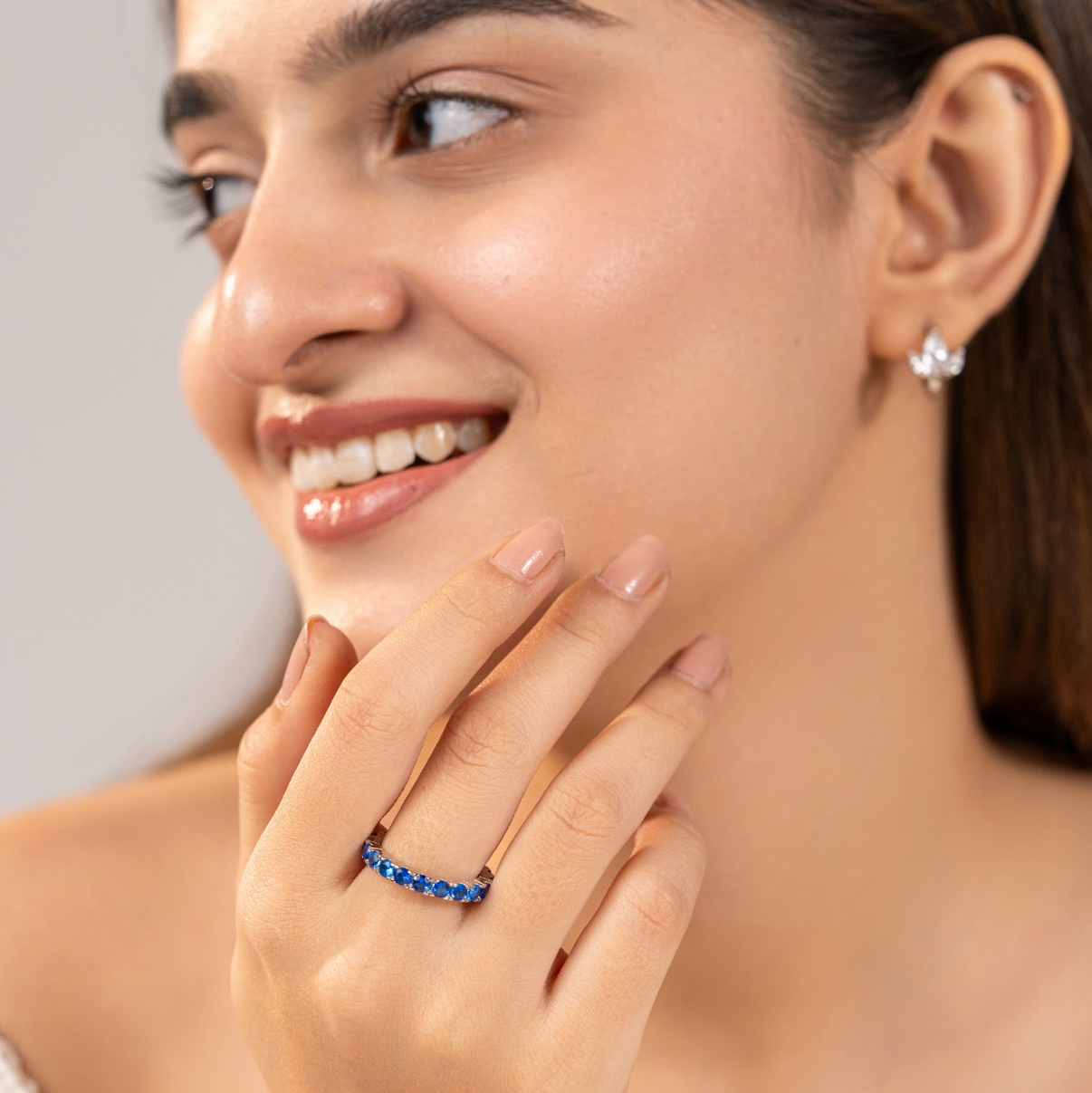 Blue zircon eternity band