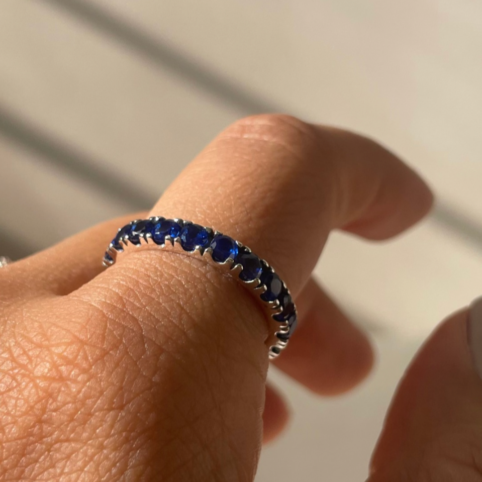 Blue zircon eternity band